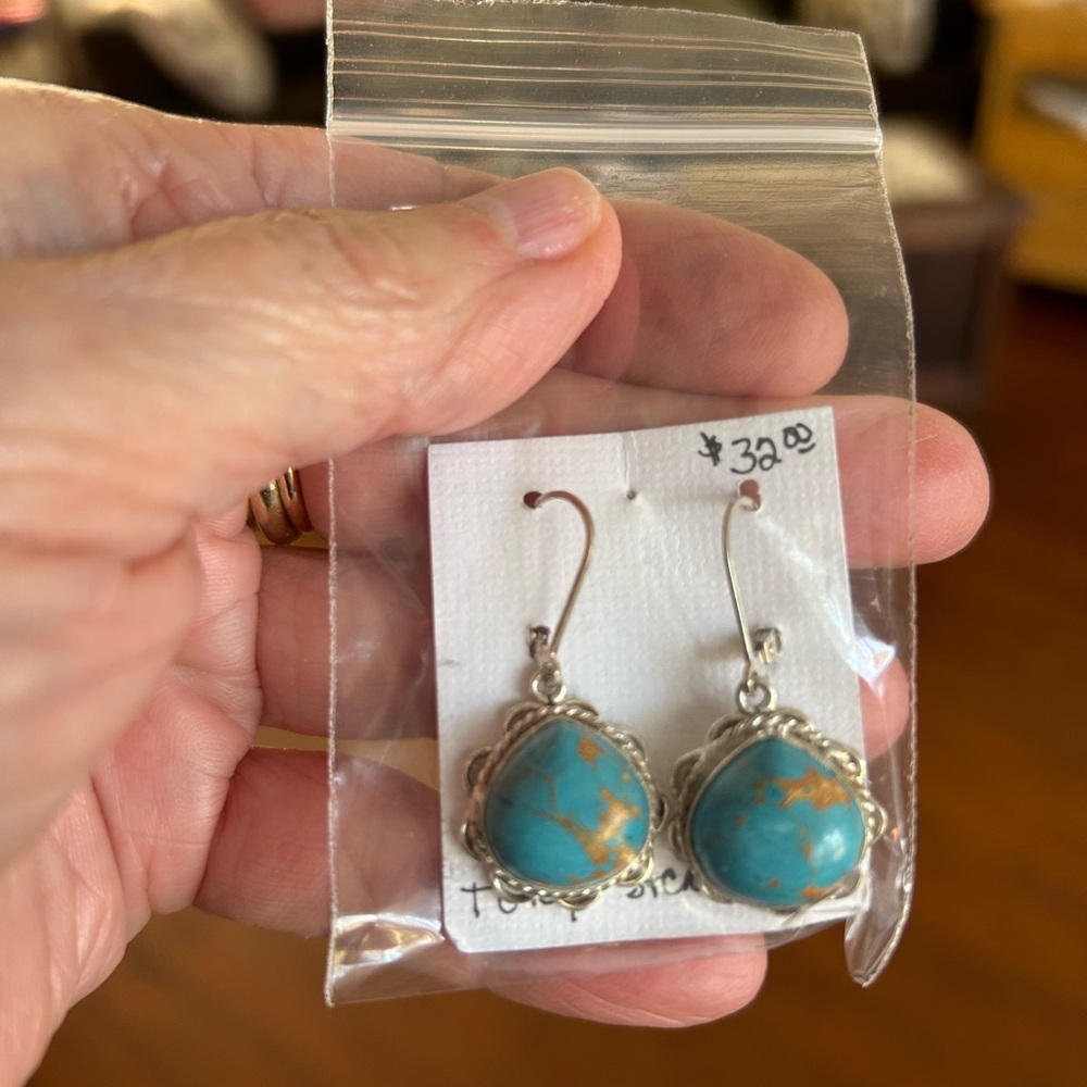 Turquoise heat treated with gold. Sterling silver earrings